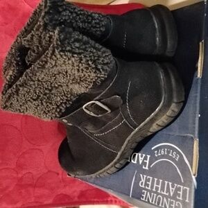Boots by Faded Glory. Black in color with buckles. Fur tops. Suede. Size 9.
